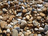 pebble-beach-stones-sea-nature-1128022.jpg