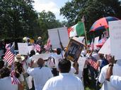 A day without immigrants - flags, protesters, signs.jpg