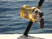 deep-sea-fishing-penn-reel-ocean-1323571.jpg