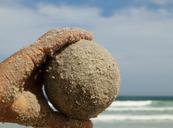 ball-sand-hand-child-keep-balance-974568.jpg