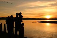 sunsets-family-happiness-beach-1328102.jpg