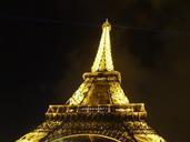 eiffel-tower-night-illuminated-650344.jpg