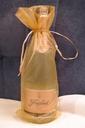 champagne-gift-loop-packed-golden-237775.jpg