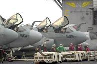 Flight-deck-personnel-remove-catapult-slot-seals.jpg