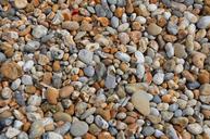 pebbles-stones-background-552534.jpg