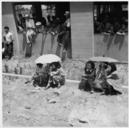 Stockton,_California._These_evacuees_of_Japanese_ancestry_are_watching_the_arrival_of_buses_bringin_._._._-_NARA_-_537731.jpg