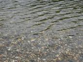 pebble-wave-water-stones-surface-1455071.jpg