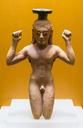 Perfume bottle in shape of an athlete agora museum athens.jpg