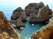 coastline-rocks-boats-nature-1554933.jpg