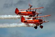 biplane-contrails-vapor-trails-19489.jpg