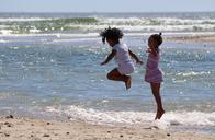 children-jump-south-africa-beach-486978.jpg