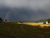 thunderstorm-rainbow-field-50428.jpg