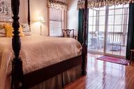 bedroom-bed-hardwood-floor-curtains-670249.jpg