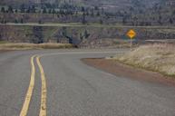 road-yellow-lines-rocks-sign-1224997.jpg