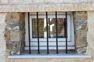 window-old-house-facade-bars-wall-508567.jpg