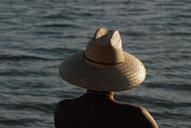 straw-hat-man-sea-sunlight-sunset-70696.jpg