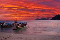 boats-beach-sunset-footprints-sand-1183373.jpg