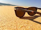 sunglasses-sand-sun-beach-nature-115870.jpg