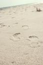 footprints-sand-beach-923855.jpg