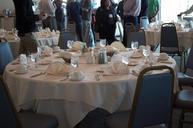 Dinner_tables_set_at_conference_center.jpg