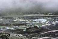 melting-Rhone-glacier-and-lake-Switzerland.jpg