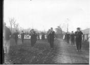 Band_marching_to_Miami-Denison_football_game_1914.jpg