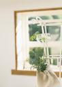 Rosemary-bunch-nestled-inside-a-burlap-bag-and-window.jpg