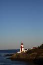 lighthouse-canada-evening-sea-462413.jpg