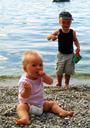 children-water-stones-beach-play-392979.jpg