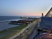 ocean-shore-beach-boardwalk-sunset-694076.jpg