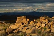 Boulders_Glow_with_Clouds_in_the_Distance.jpg