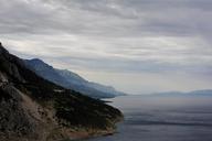 coastline-overcast-cloudy-mountains-455759.jpg