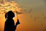 bubbles-sunset-silhouette-sun-1038648.jpg