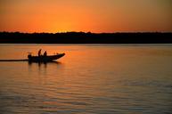 sunset-silhouette-boat-people-1647079.jpg