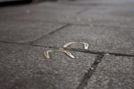 horseshoes-sidewalk-ground-pavement-498455.jpg