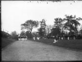 Crowd,_cheerleaders_and_band_on_field_at_Miami-Oberlin_football_game_1923.jpg