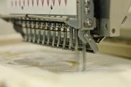 embroiderer-sewing-cloth-tissue-369100.jpg