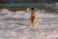 surf-wading-woman-ocean-beach-sea-643435.jpg