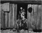 Farm_Security_Administration_sharecropper_photo_of_Mrs._Handley_and_some_of_her_children_in_Walker_County,_Alabama._-_NARA_-_195926.tif