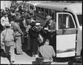 Byron,_California._Farm_families_of_Japanese_ancestry_boarding_buses_for_Turlock_Assembly_Center_65_._._._-_NARA_-_537457.jpg