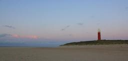 lighthouse-evening-sky-sand-sea-568875.jpg