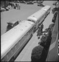 Photograph_of_Baggage_Belonging_to_Evacuees_of_Japanese_Ancestry_Ready_to_Be_Loaded_into_Moving_Vans_-_NARA_-_537703.jpg