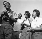 Civil_Rights_March_on_Washington,_D.C._(Four_young_marchers_singing.)_-_NARA_-_542025.tif