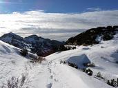 trail-snow-footsteps-mountain-sky-566093.jpg