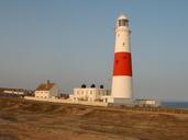 lighthouse-sea-sunset-ocean-beach-455510.jpg