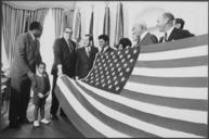 Presentation_of_American_Flag_-_NARA_-_194701.tif