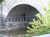 under-a-bridge-river-saxophone-597094.jpg