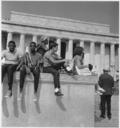 Civil_Rights_March_on_Washington,_D.C._(Young_men_and_women_sitting_in_front_of_the_Lincoln_Memorial.)_-_NARA_-_542048.tif