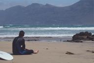 surfer-beach-sand-shore-water-925707.jpg