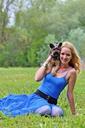 smile-yorkie-dogs-blonde-woman-lie-1339857.jpg